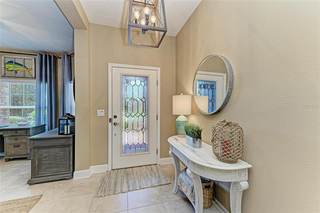 5307 65th Terrace East Ellenton, FL 34222 - Photo 7 of 47 a room with furniture and a mirror