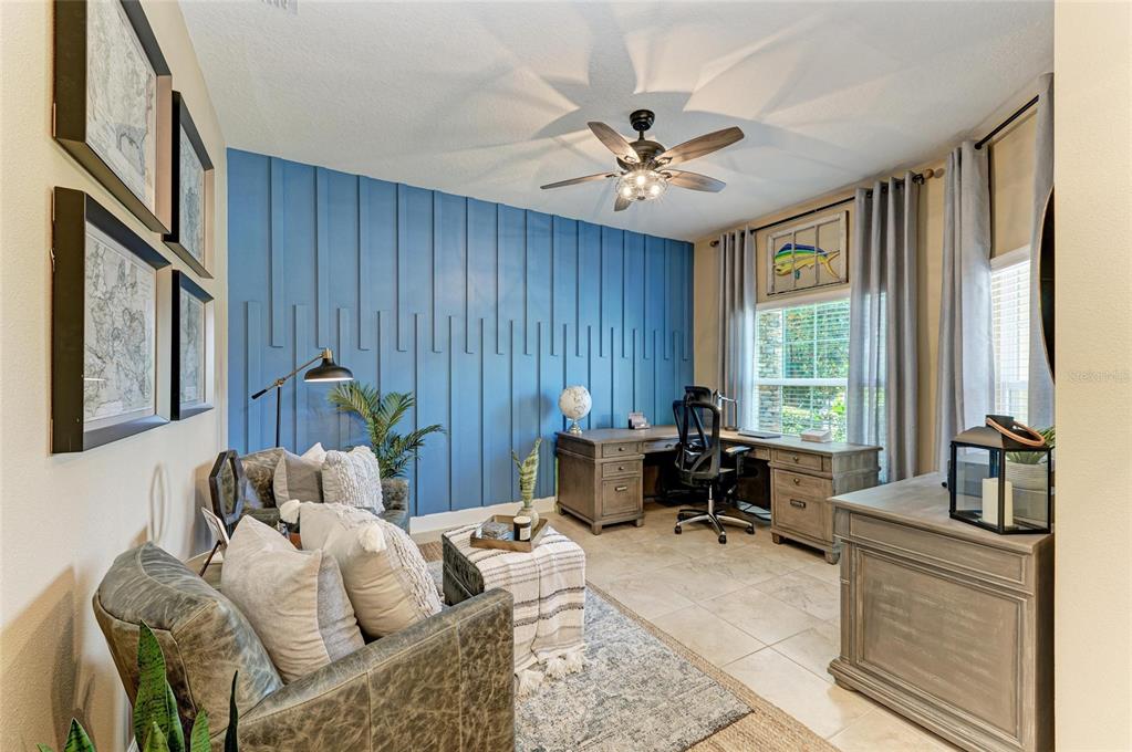 5307 65th Terrace East Ellenton, FL 34222 - Photo 8 of 47 a bedroom with furniture and a window