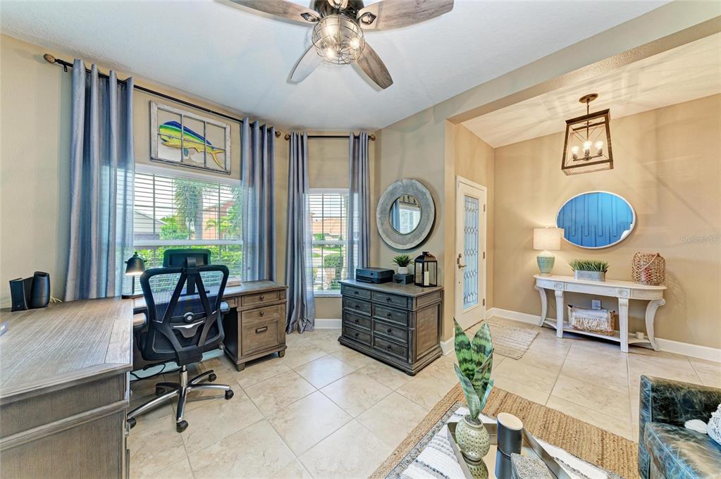 5307 65th Terrace East Ellenton, FL 34222 - Photo 9 of 47 a living room with furniture and a window
