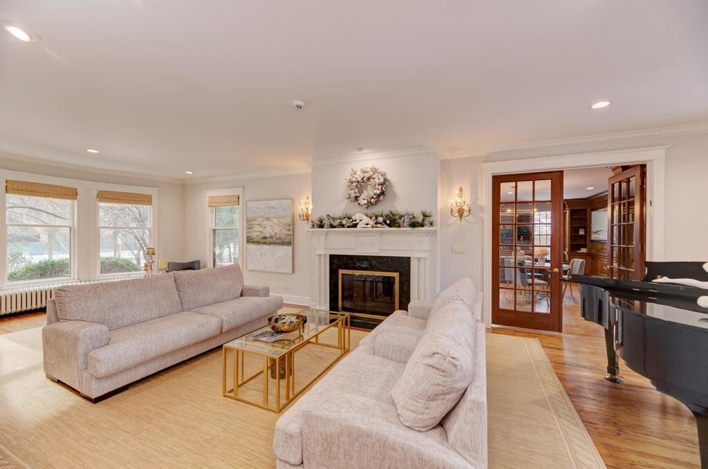 1499 Sheridan Road Highland Park, IL 60035 - Photo 13 of 87 a living room with furniture and a fireplace