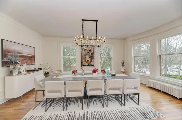 a living room with furniture fireplace and flat screen tv