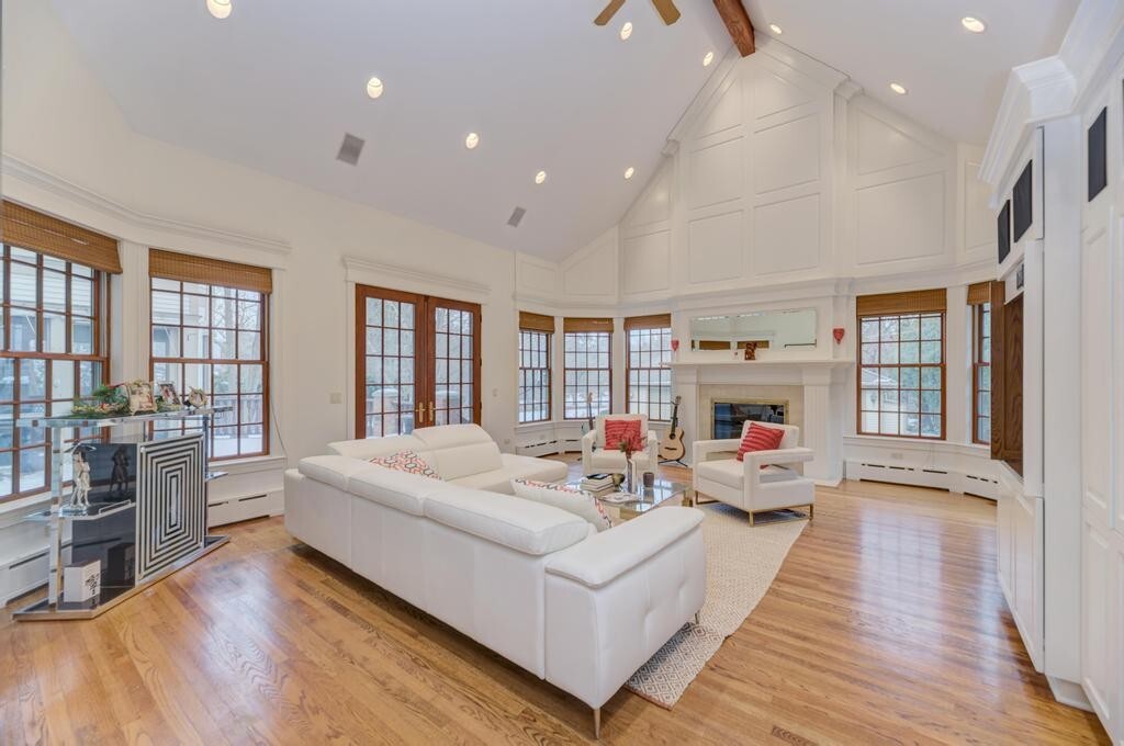 1499 Sheridan Road Highland Park, IL 60035 - Photo 31 of 84 a living room with fireplace furniture and a wooden floor