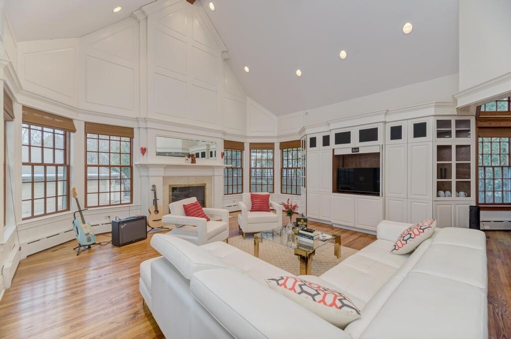 1499 Sheridan Road Highland Park, IL 60035 - Photo 32 of 84 a living room with furniture large window and a flat screen tv