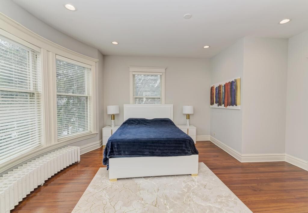 1499 Sheridan Road Highland Park, IL 60035 - Photo 42 of 84 a living room with a rug and a wooden floor