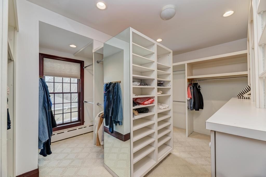 1499 Sheridan Road Highland Park, IL 60035 - Photo 56 of 87 a view of walk in closet with clothes and shoes