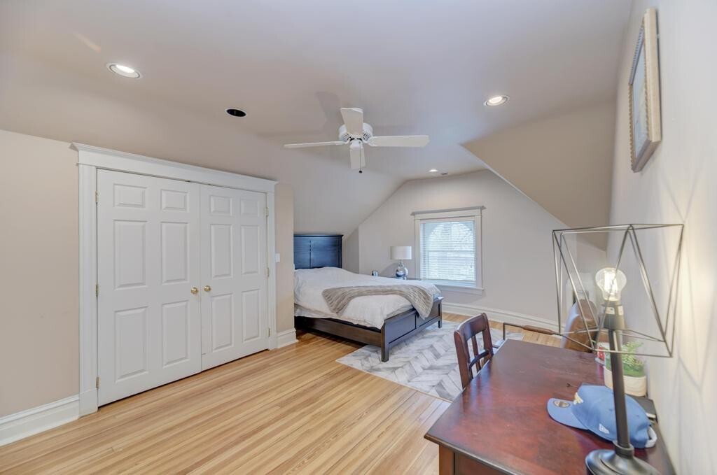1499 Sheridan Road Highland Park, IL 60035 - Photo 65 of 87 a bedroom with furniture and a wooden floor