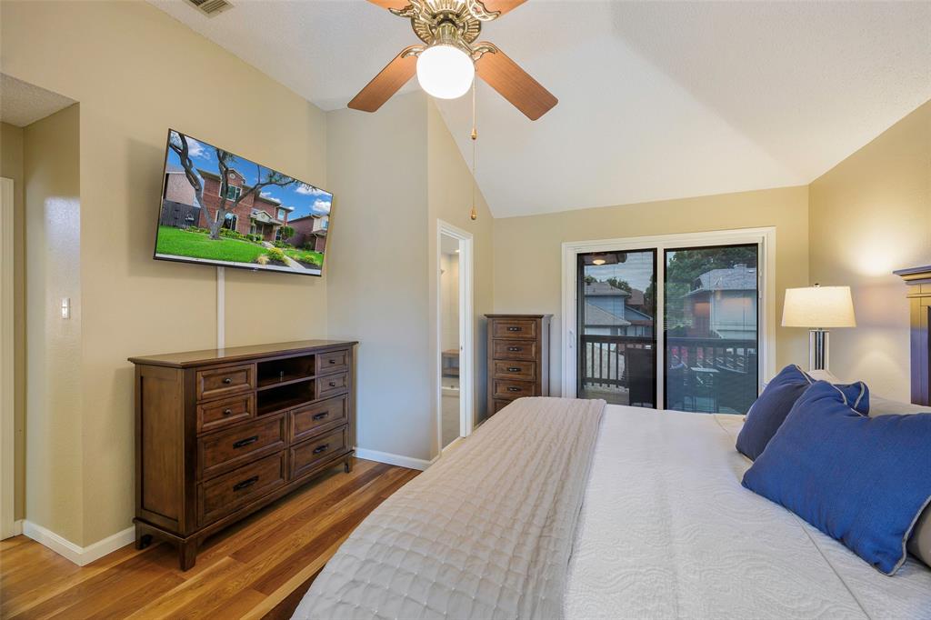 2903 Fort Point Lane Carrollton, TX 75007 - Photo 18 of 27 a bedroom with a bed and a flat screen tv