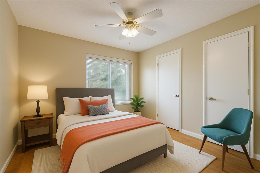 2903 Fort Point Lane Carrollton, TX 75007 - Photo 22 of 27 a bedroom with a bed and a chair