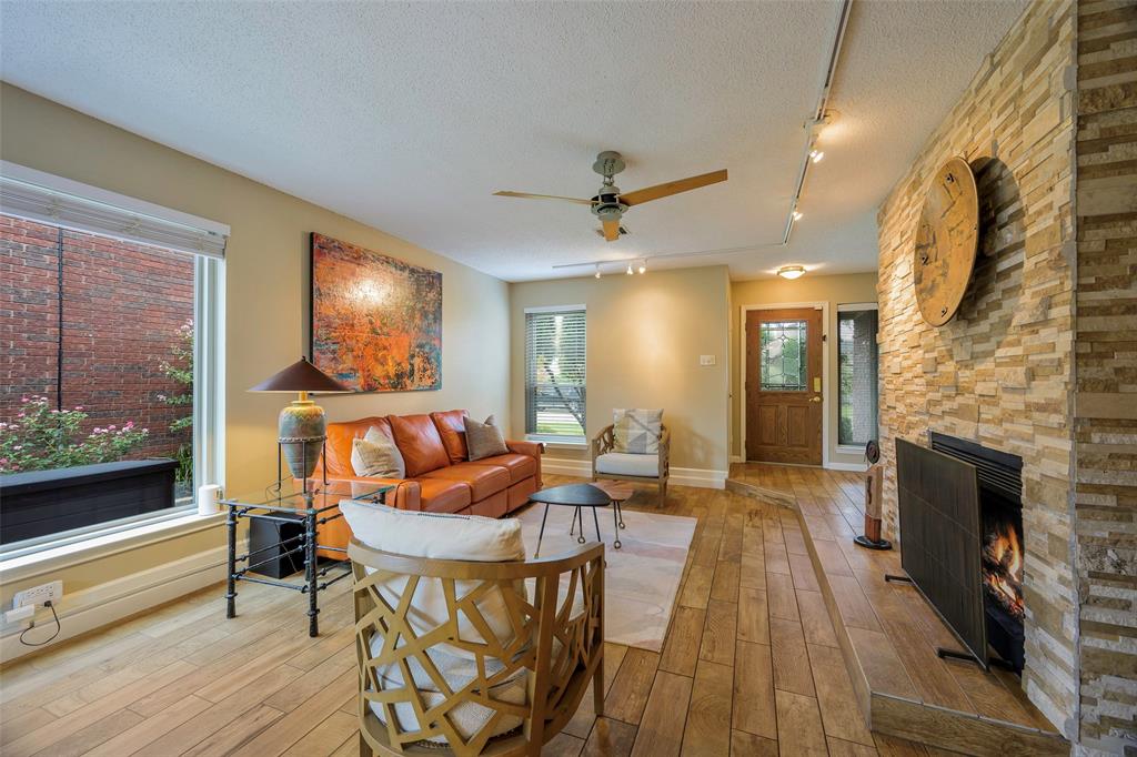 2903 Fort Point Lane Carrollton, TX 75007 - Photo 7 of 27 a living room with furniture and a fireplace