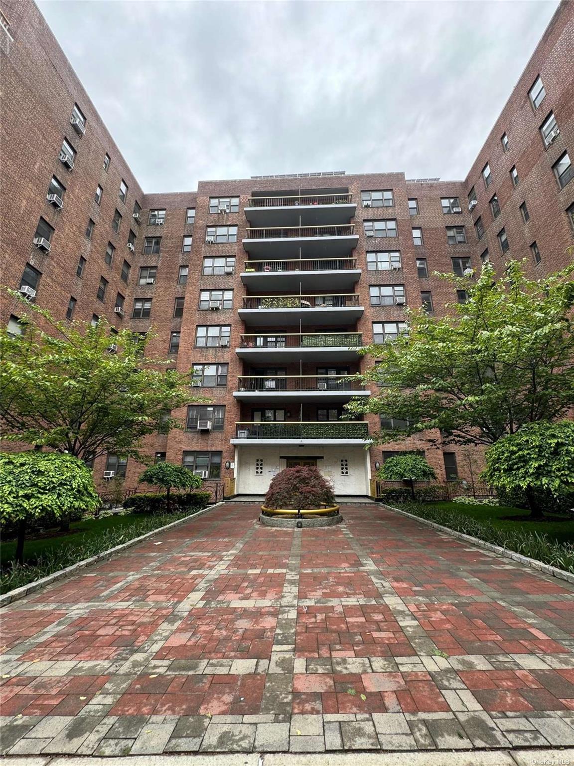 67-76 Booth Street, Unit 1G Queens, NY 11375 - Photo 1 of 15 a view of a tall building
