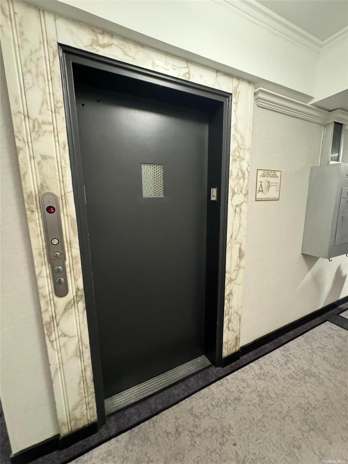 67-76 Booth Street, Unit 1G Queens, NY 11375 - Photo 11 of 15 a view of front door