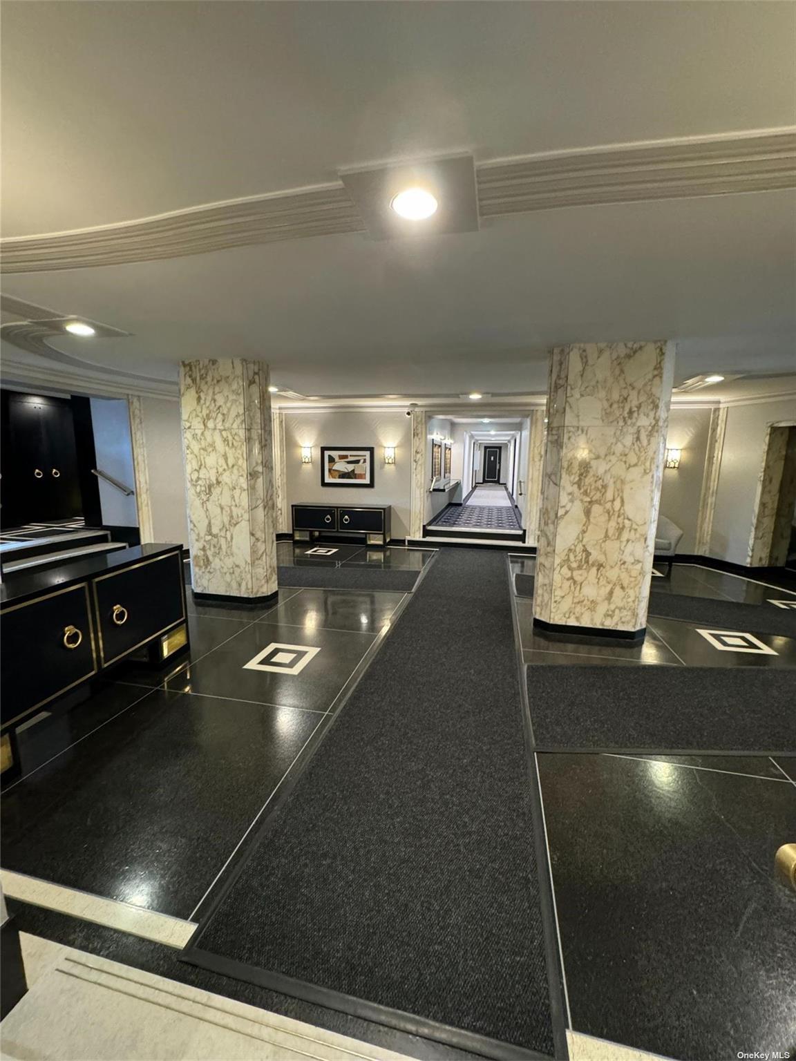 67-76 Booth Street, Unit 1G Queens, NY 11375 - Photo 3 of 15 a living room with stainless steel appliances kitchen island granite countertop lots of counter top space