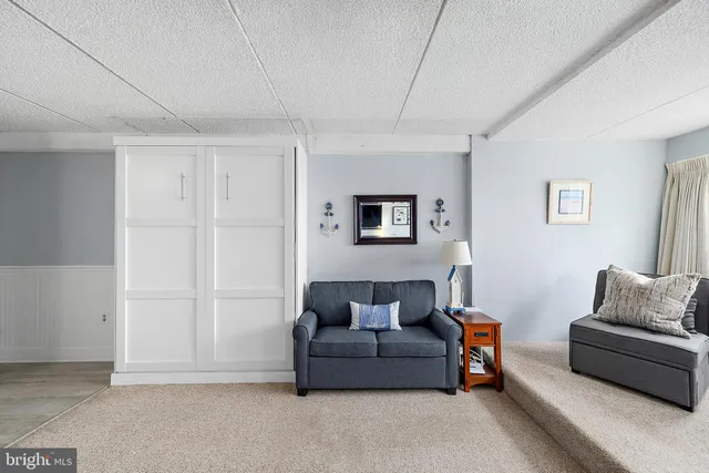 a kitchen with granite countertop cabinets and stainless steel appliances