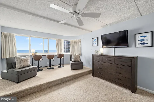 a view of balcony with furniture