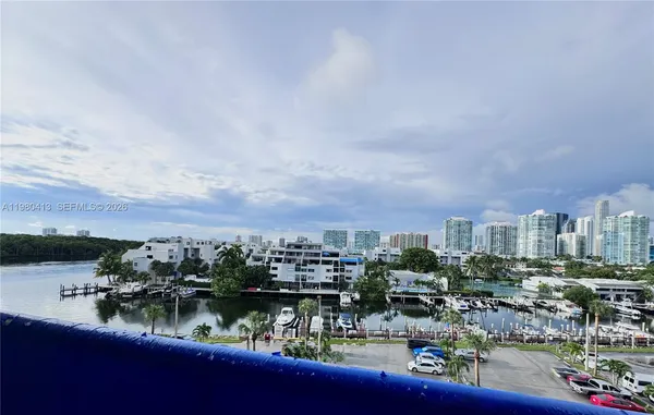 a view of a lake with a city