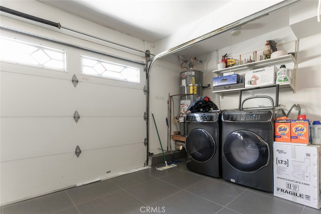 7901 Vía Stefano Burbank, CA 91504 - Photo 22 of 58 a utility room with dryer and washer