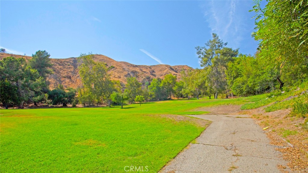 7901 Vía Stefano Burbank, CA 91504 - Photo 57 of 58 a view of a grassy field with an trees