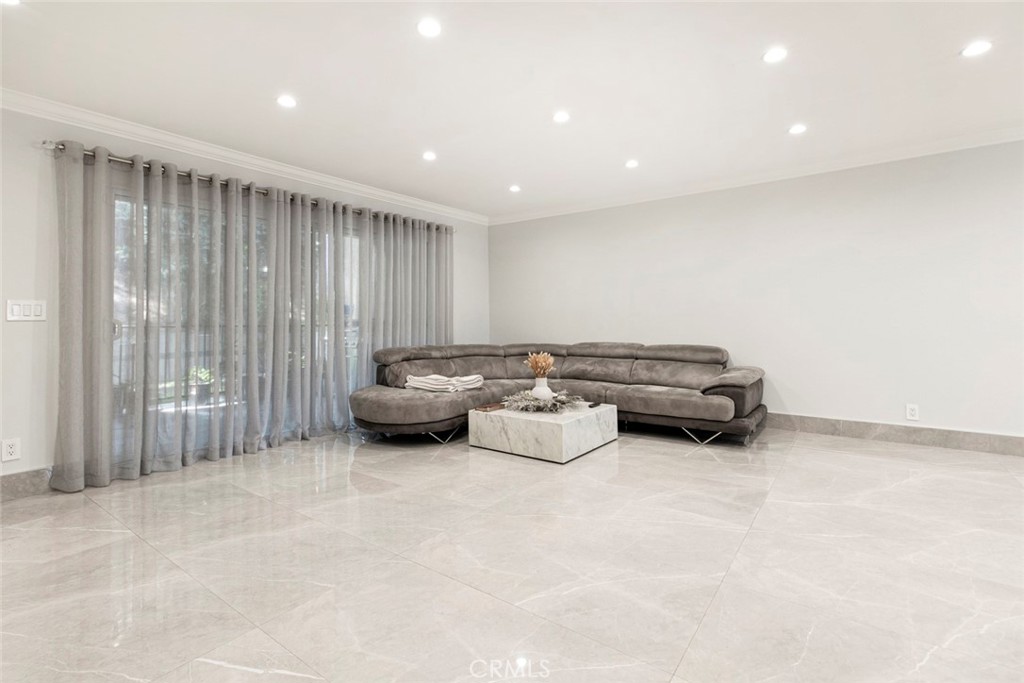 7901 Vía Stefano Burbank, CA 91504 - Photo 7 of 58 a living room with furniture and a area