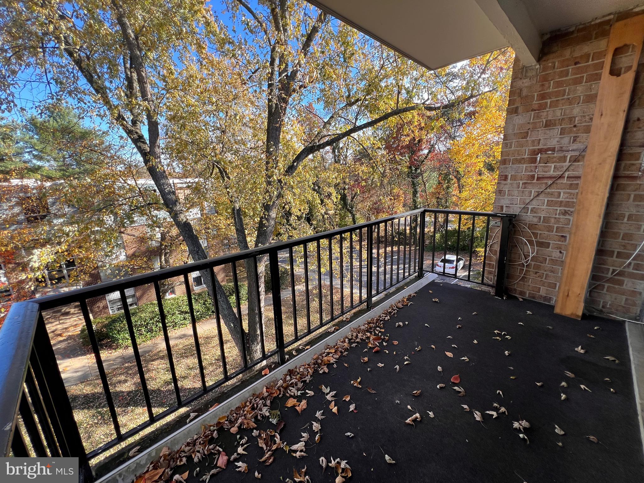 3964 Bel Pre Road, Unit 8 Silver Spring, MD 20906 - Photo 13 of 24 a view of balcony with wooden floor
