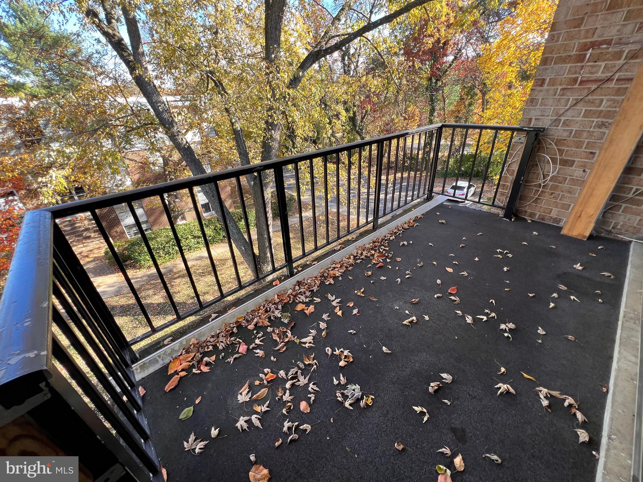3964 Bel Pre Road, Unit 8 Silver Spring, MD 20906 - Photo 14 of 24 a balcony with street view