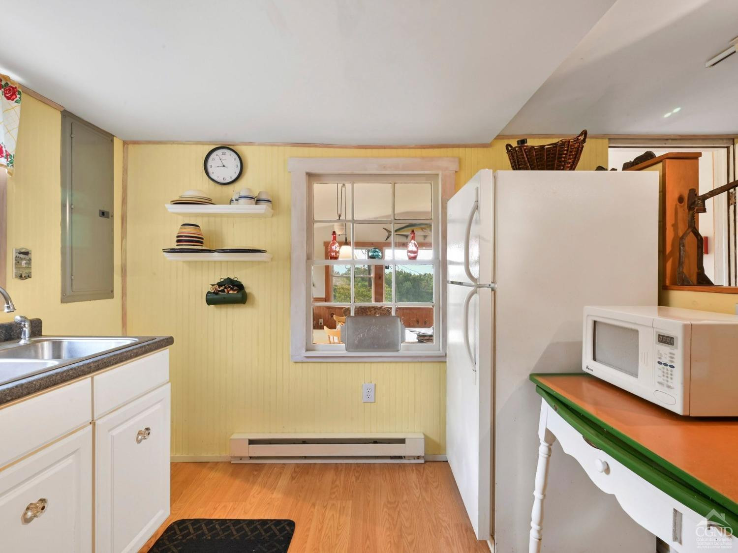 157 Horseshoe Road Conesville, NY 12076 - Photo 16 of 48 a kitchen with a refrigerator and a stove