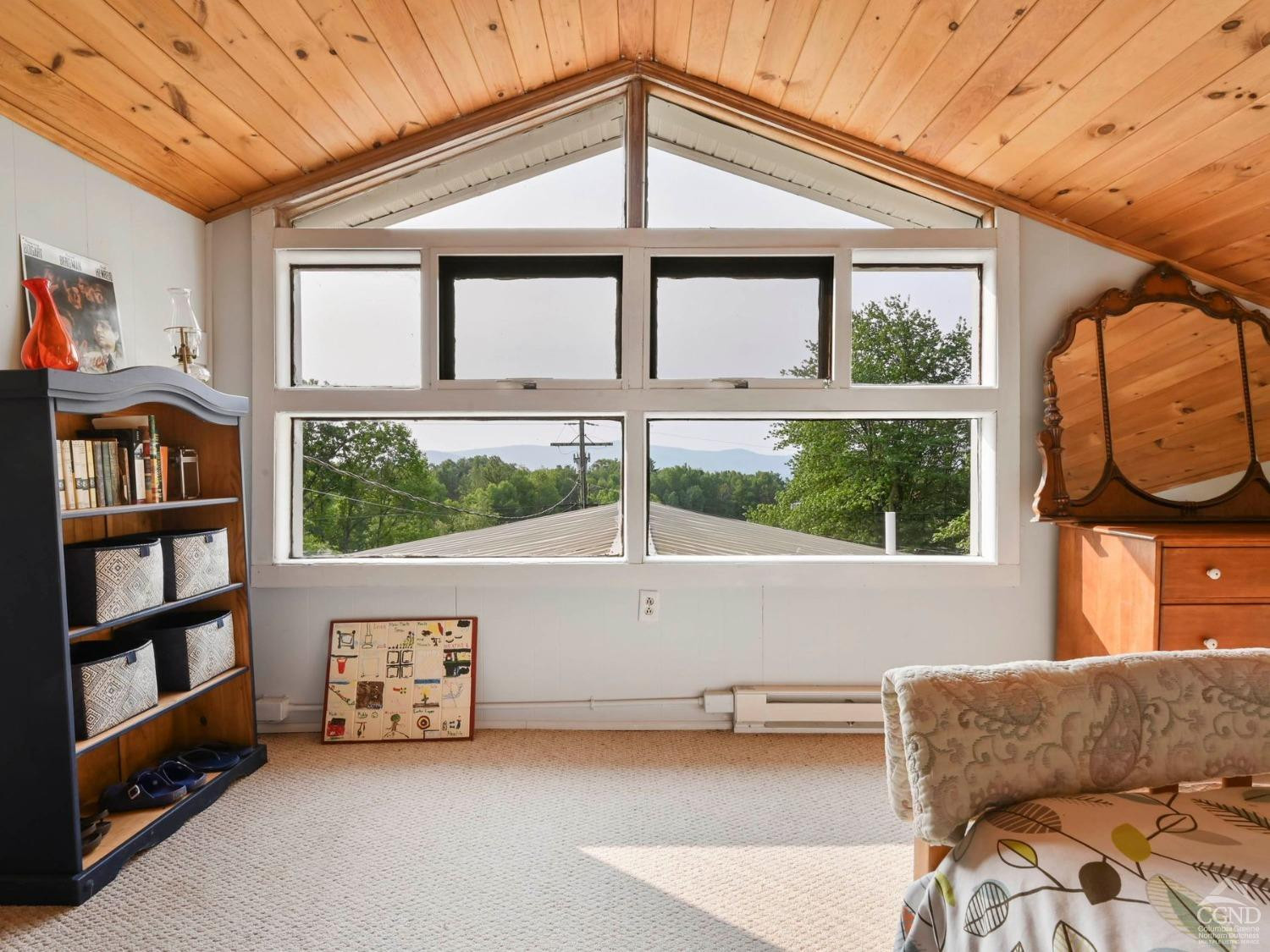 157 Horseshoe Road Conesville, NY 12076 - Photo 17 of 48 a living room with furniture and a window