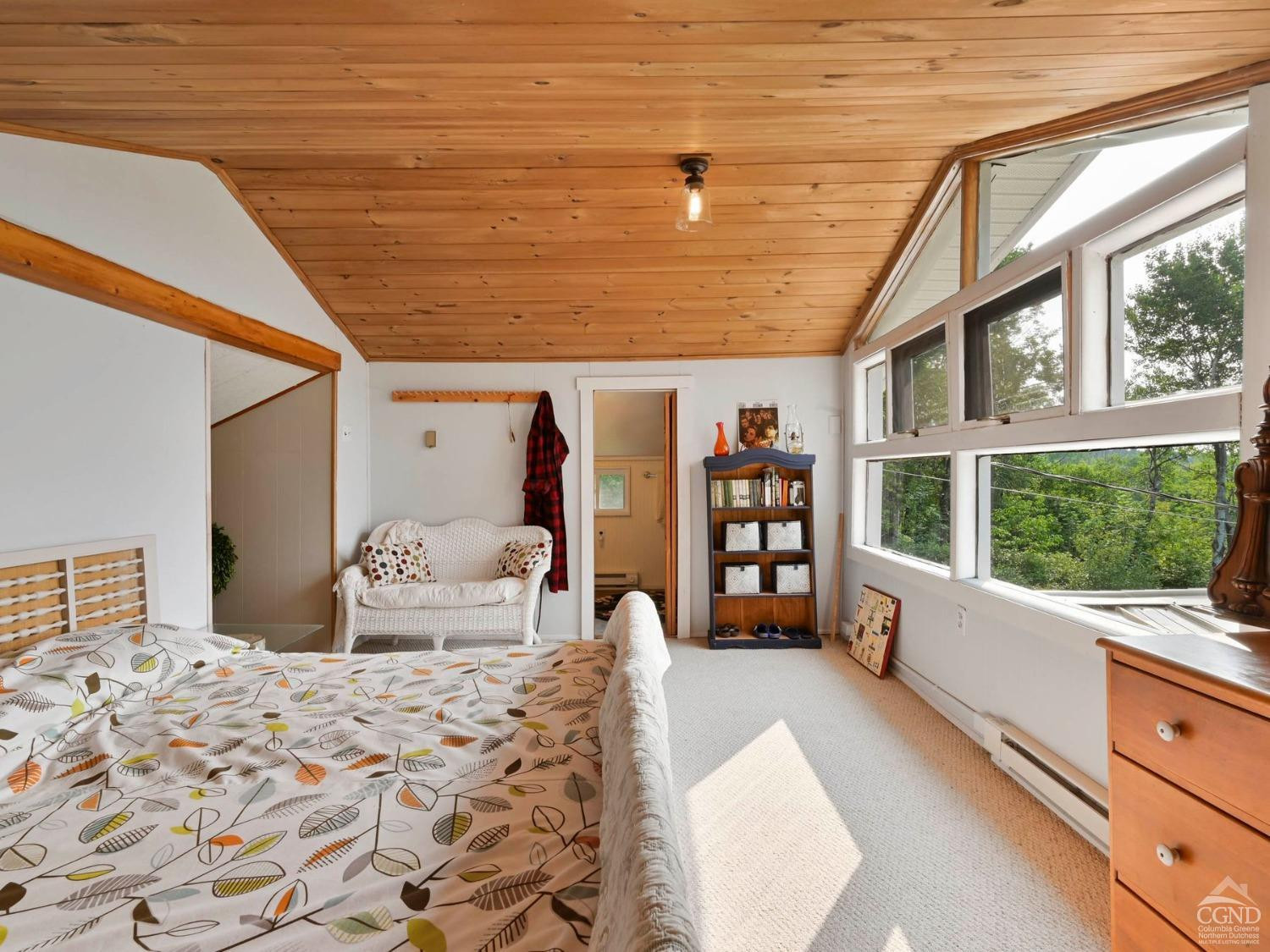 157 Horseshoe Road Conesville, NY 12076 - Photo 19 of 48 a bedroom with furniture and a large window