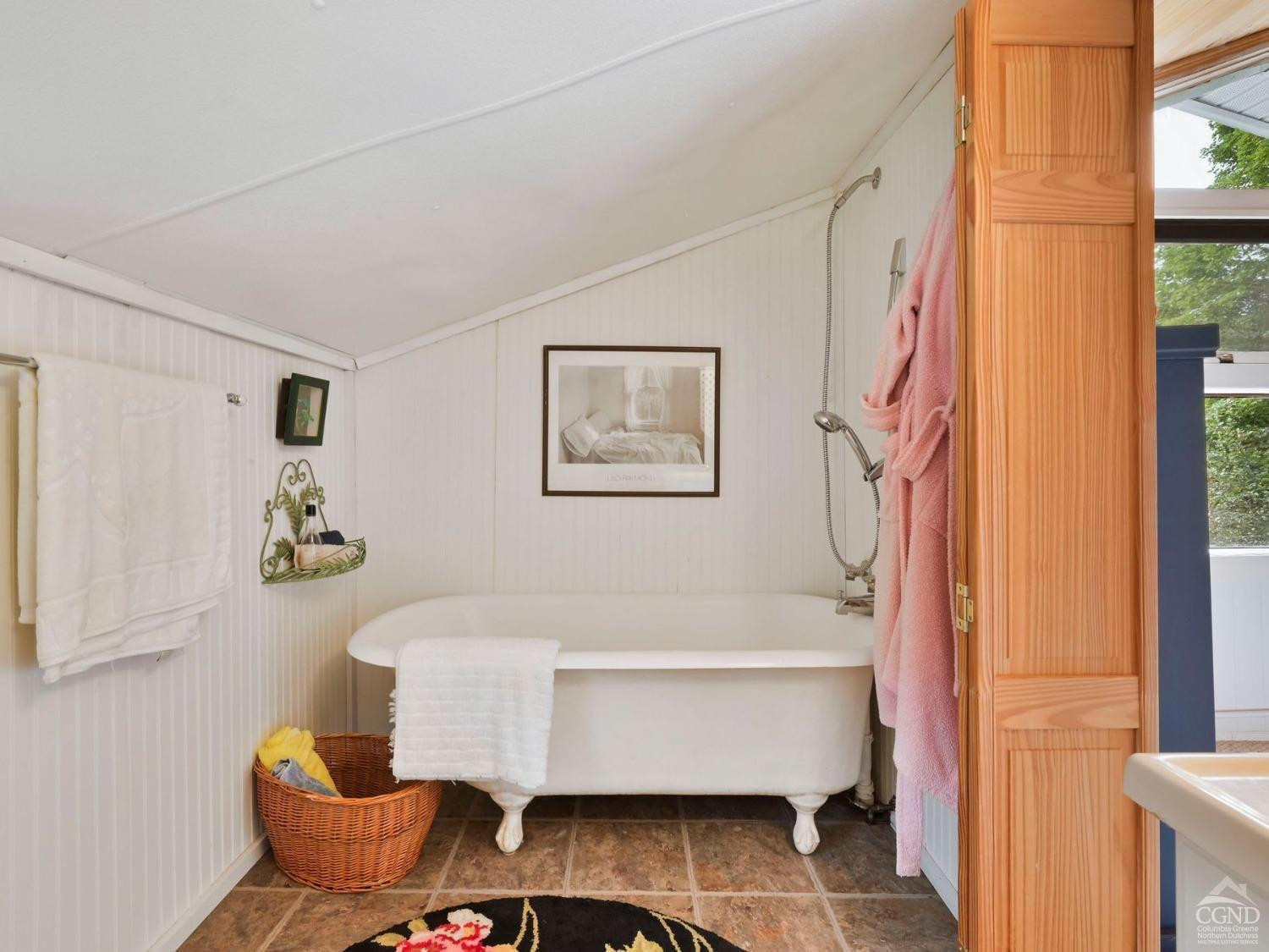 157 Horseshoe Road Conesville, NY 12076 - Photo 22 of 48 a bathroom with a bathtub and shower