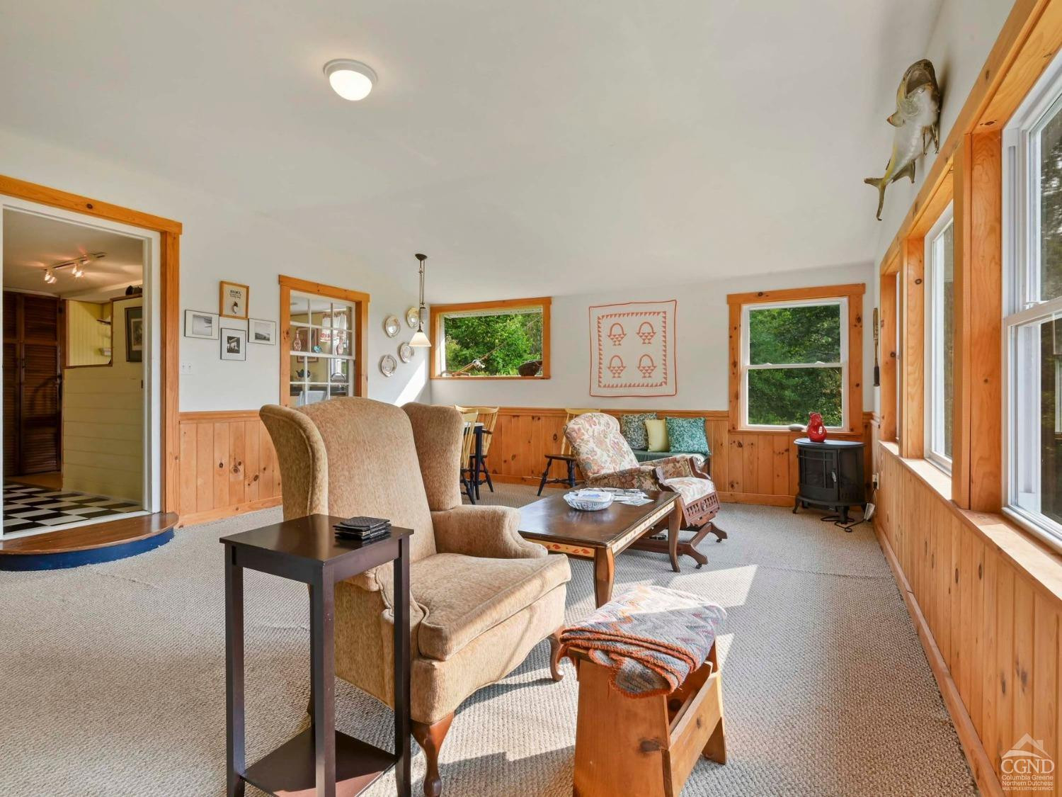 157 Horseshoe Road Conesville, NY 12076 - Photo 26 of 48 a living room with couches large window and flat screen tv
