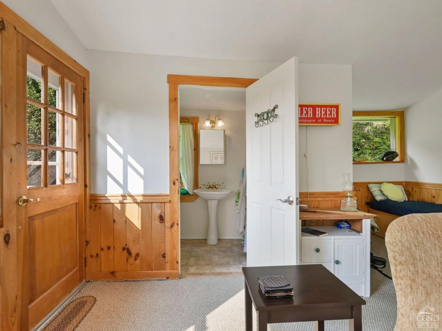 157 Horseshoe Road Conesville, NY 12076 - Photo 27 of 48 a view of a workspace with furniture and a window