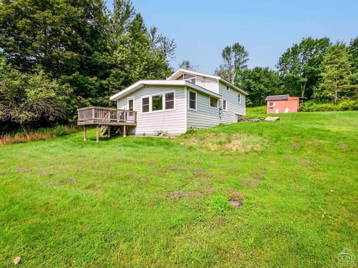 157 Horseshoe Road Conesville, NY 12076 - Photo 38 of 48 a house view with a garden space