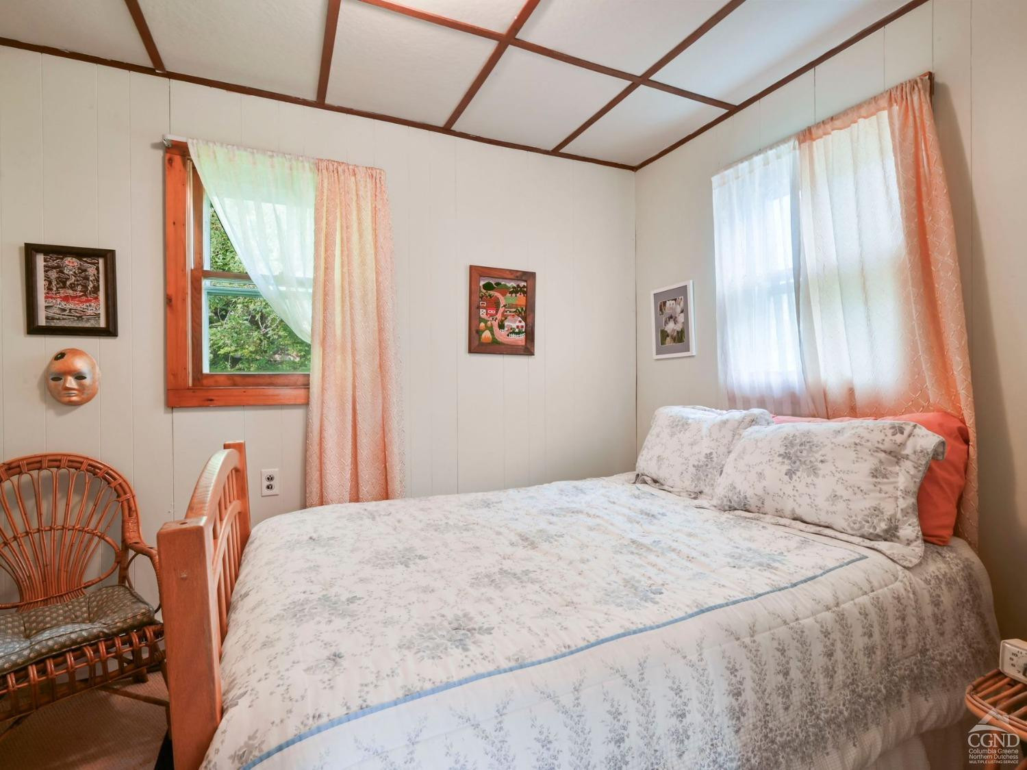 157 Horseshoe Road Conesville, NY 12076 - Photo 9 of 48 a bedroom with a bed and wooden floor