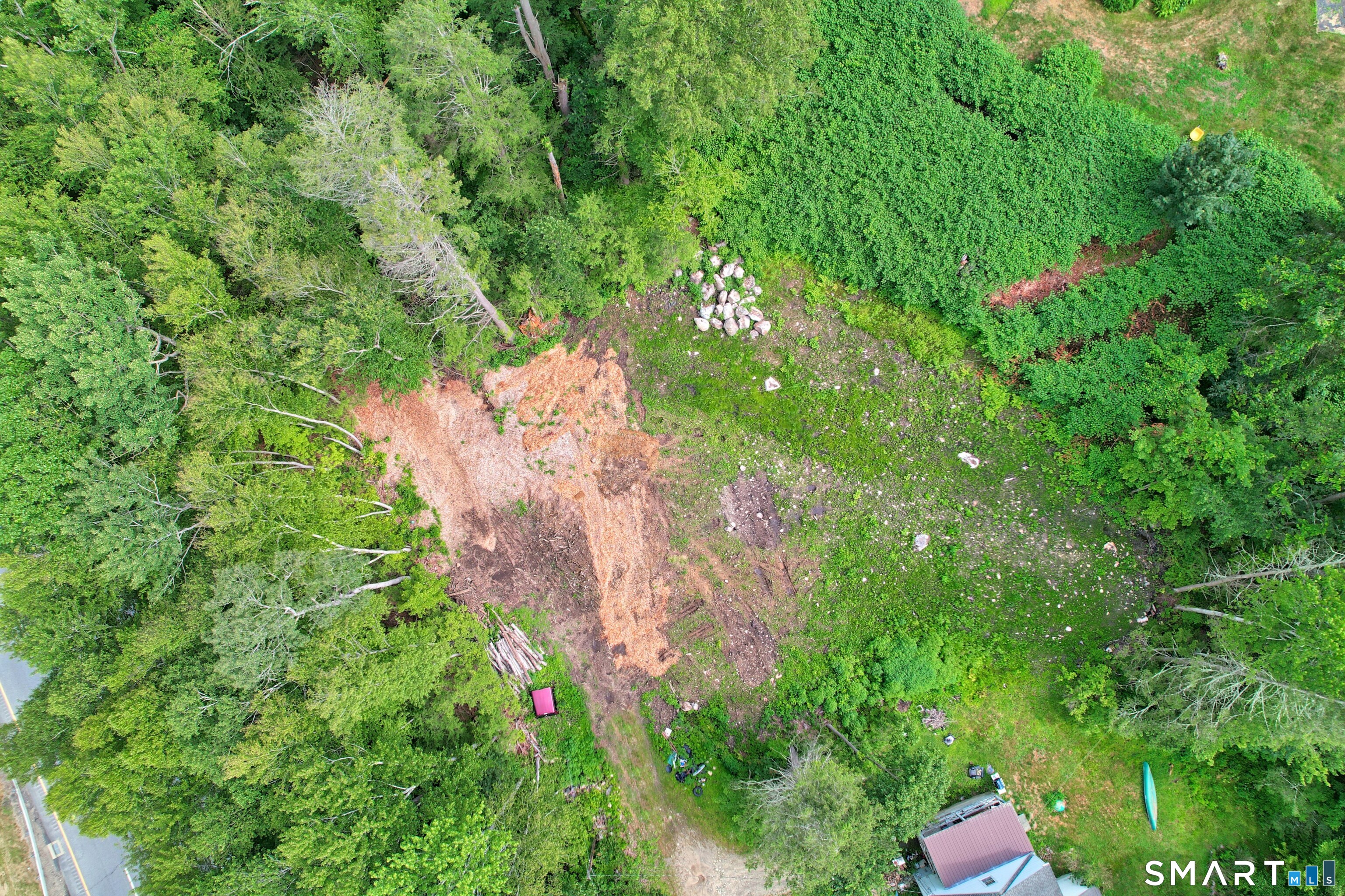 0 Decker Drive Northfield, CT 06778 - Photo 3 of 8 a backyard of a house with lots of green space