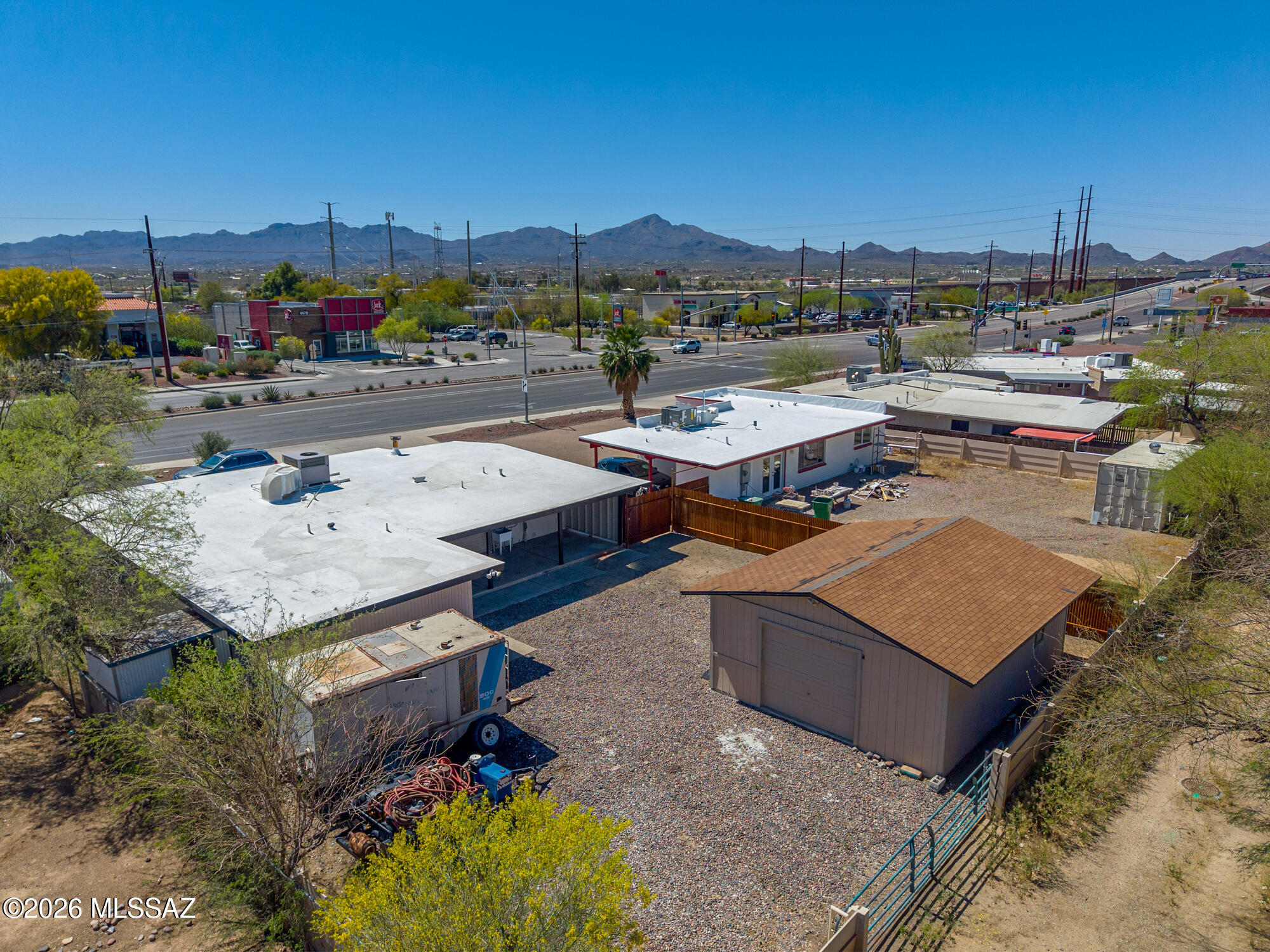 4400 West Ina Road Tucson, AZ 85741 - Photo 9 of 43 a view of a terrace with a table and chairs