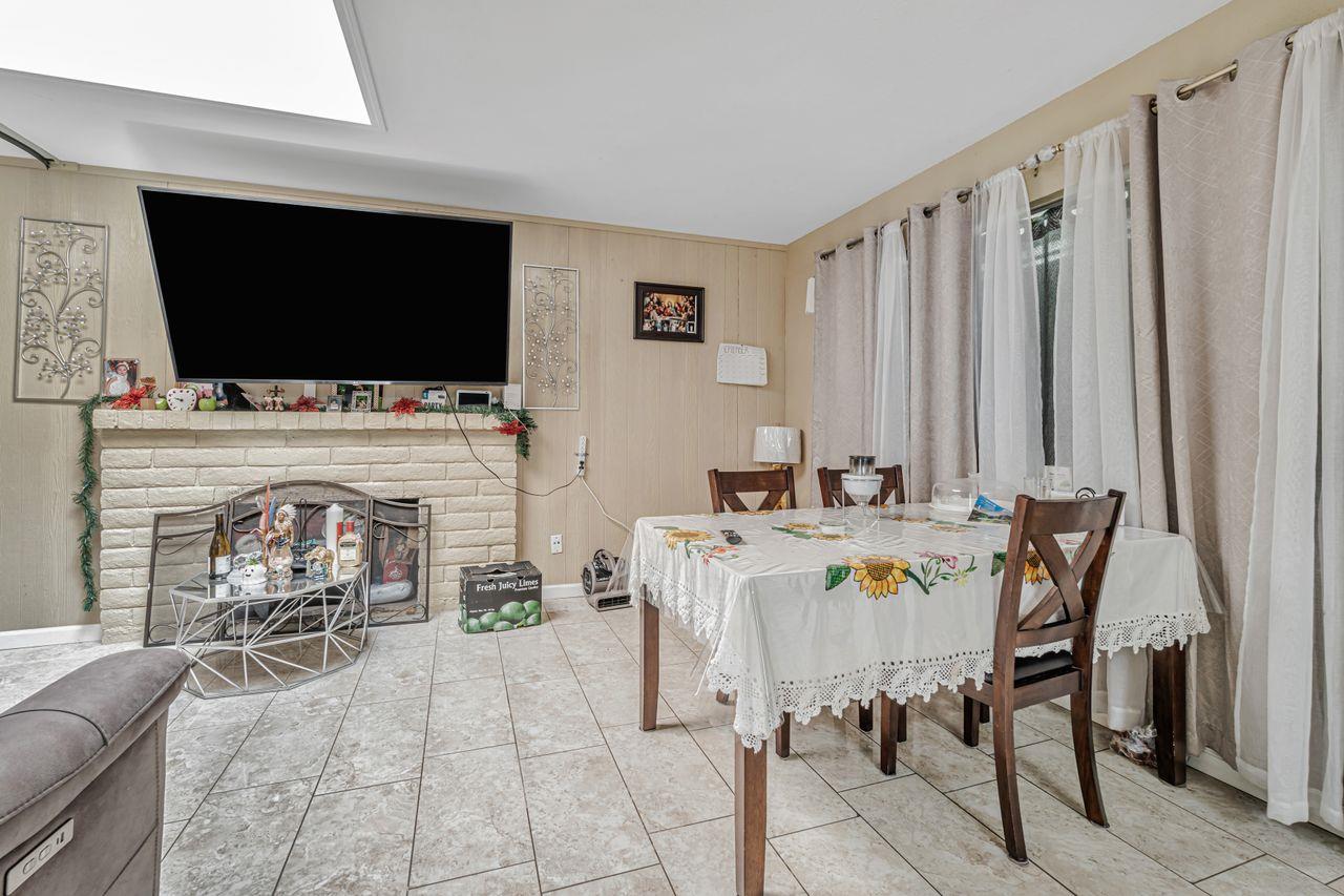 2210 San Blas Court Modesto, CA 95355 - Photo 17 of 28 a view of a livingroom with furniture and a flat screen tv