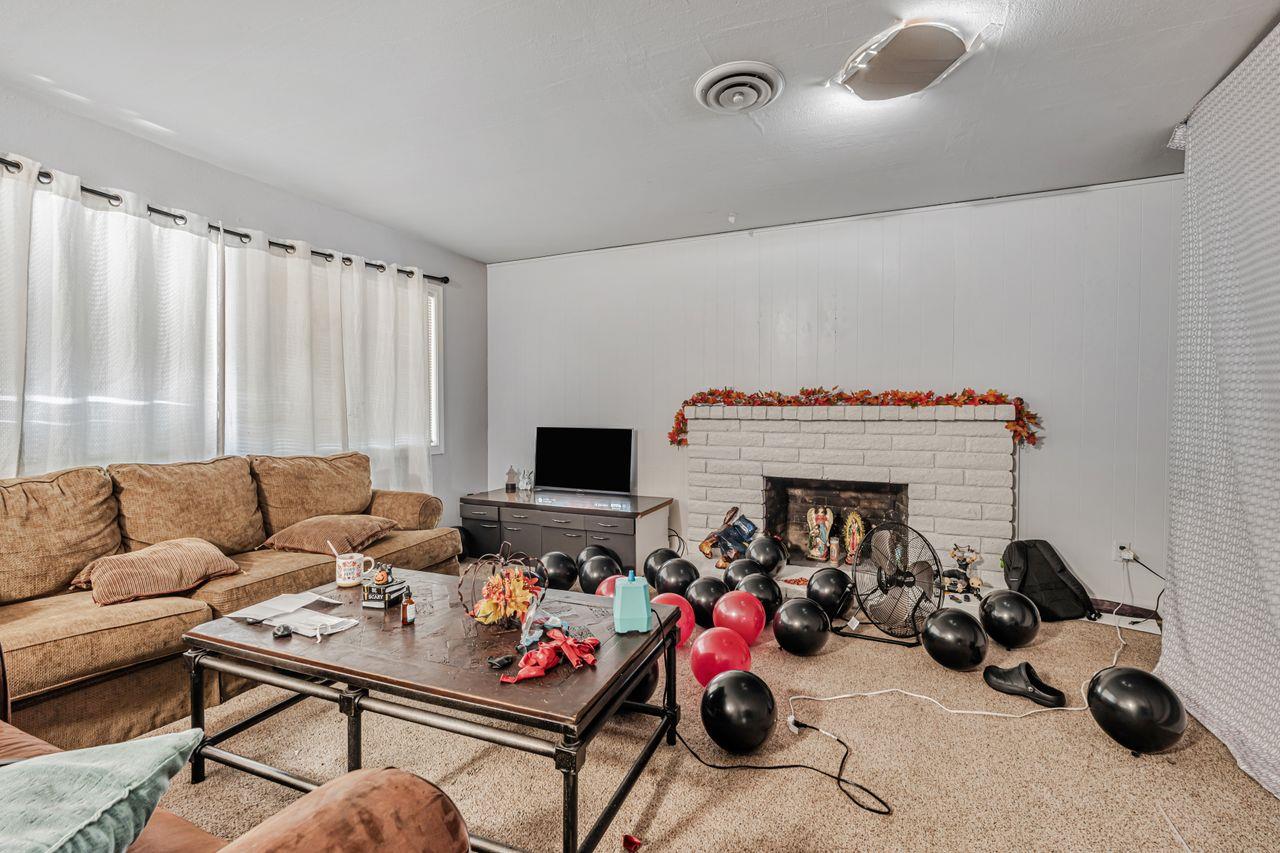 2210 San Blas Court Modesto, CA 95355 - Photo 24 of 28 a living room with furniture and a flat screen tv
