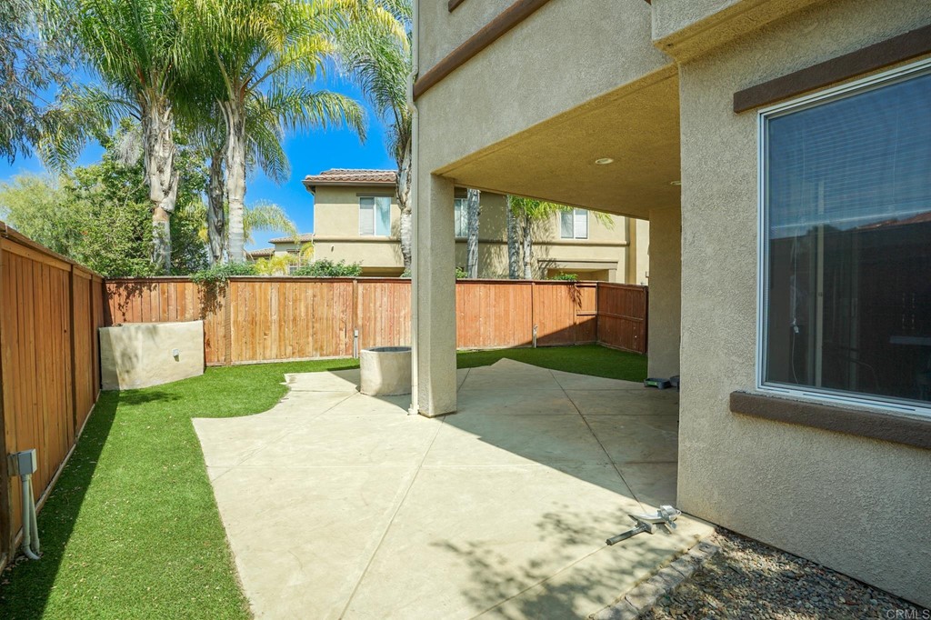 629 Sumner Way, Unit 2 Oceanside, CA 92058 - Photo 8 of 21 a view of a backyard of a house