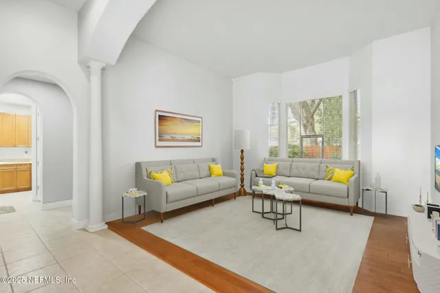 a living room with furniture and a couch