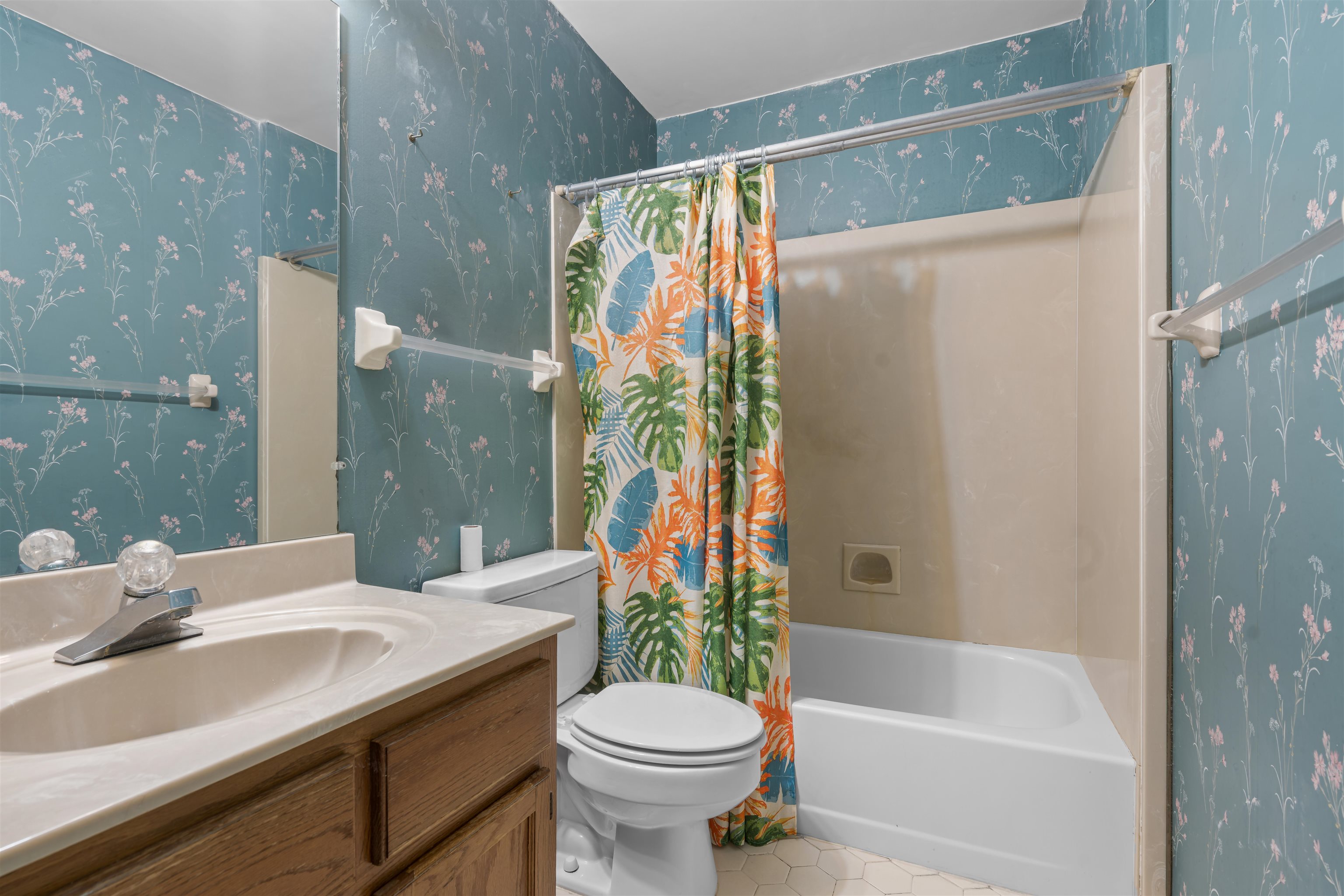 9403 Shadow Ridge Cove Cordova, TN 38016 - Photo 16 of 21 a bathroom with a sink a toilet and shower