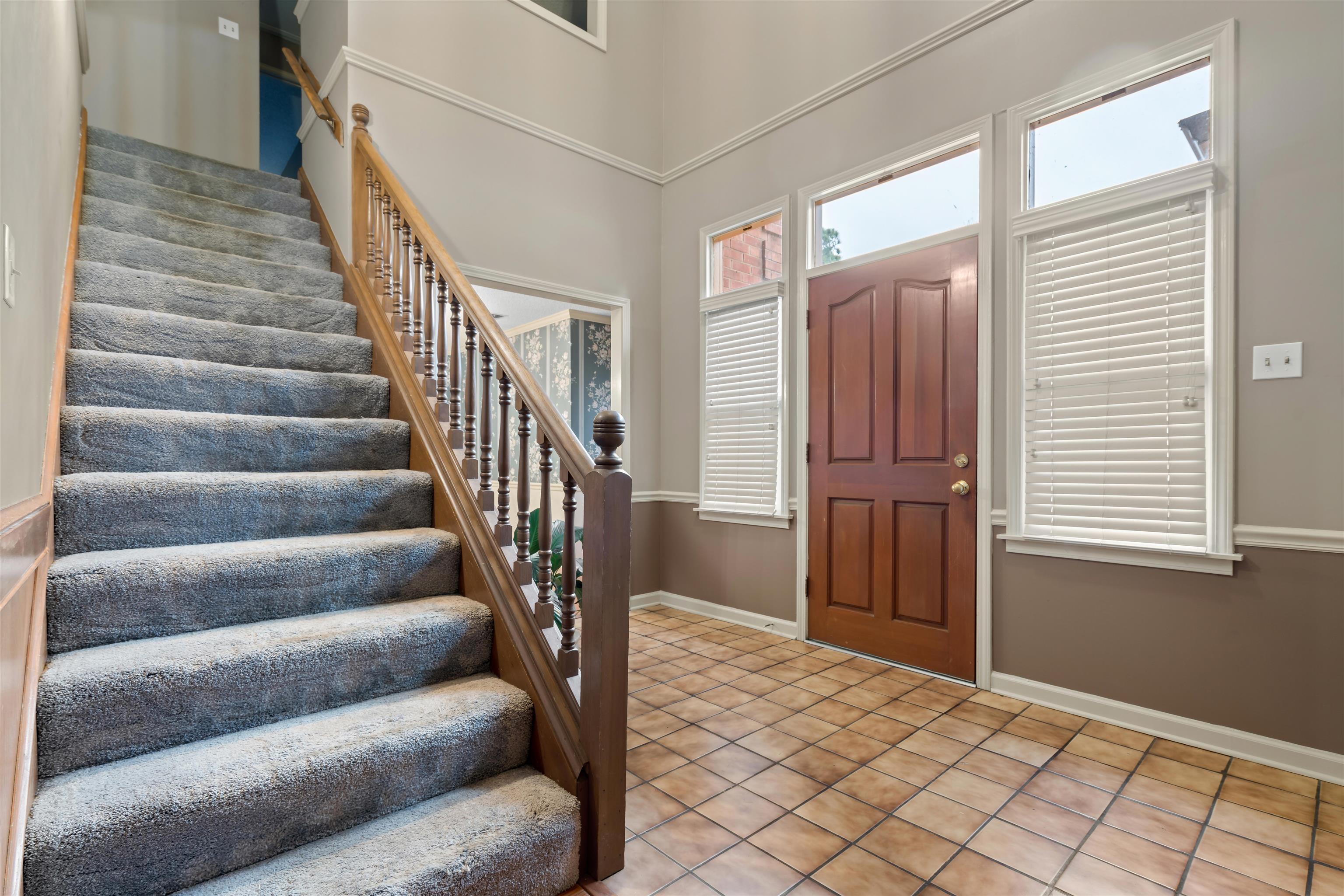 9403 Shadow Ridge Cove Cordova, TN 38016 - Photo 2 of 21 a view of entryway with stairs and wooden floor