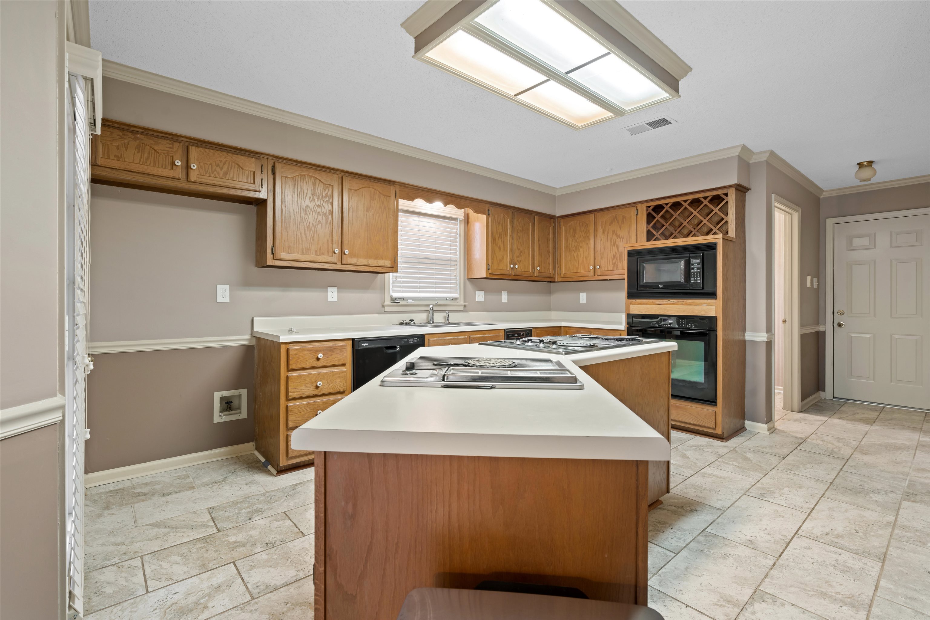 9403 Shadow Ridge Cove Cordova, TN 38016 - Photo 3 of 21 a kitchen with stainless steel appliances granite countertop a refrigerator a stove top oven a sink and dishwasher