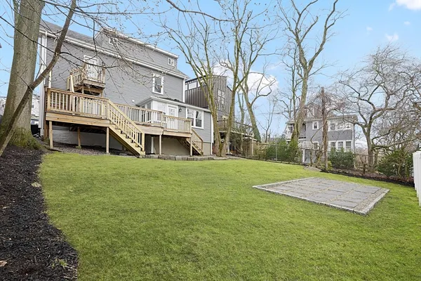 a view of a house with a yard