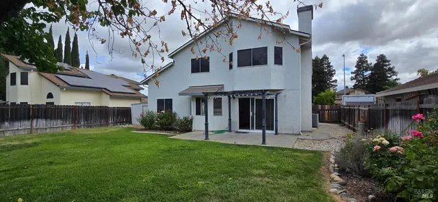 a view of a back yard of the house