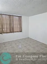 a view of a room with a window