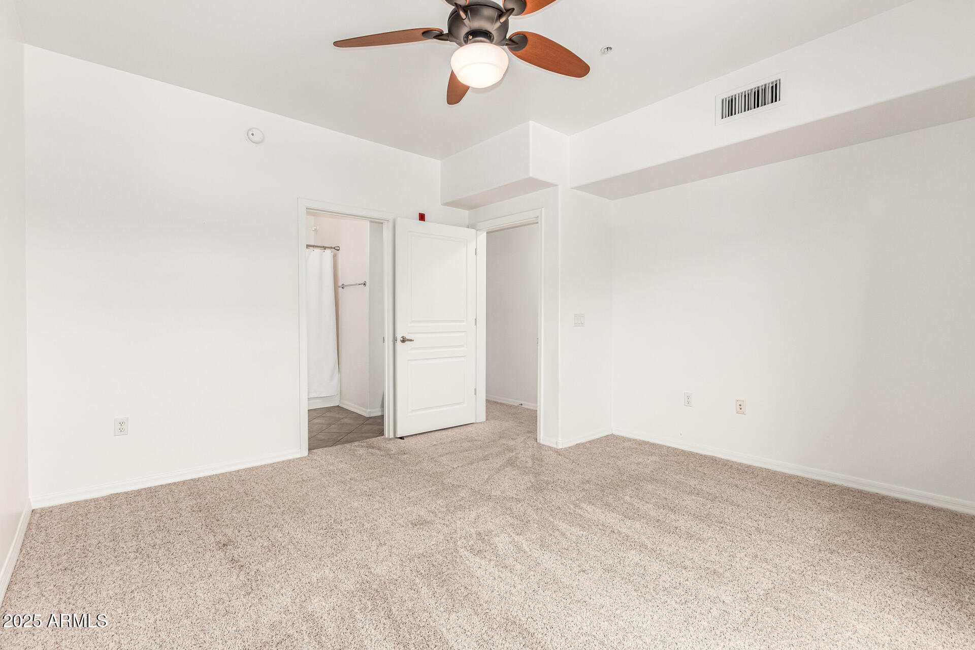 20660 North 40th Street, Unit 2120 Phoenix, AZ 85050 - Photo 17 of 39 a view of an empty room