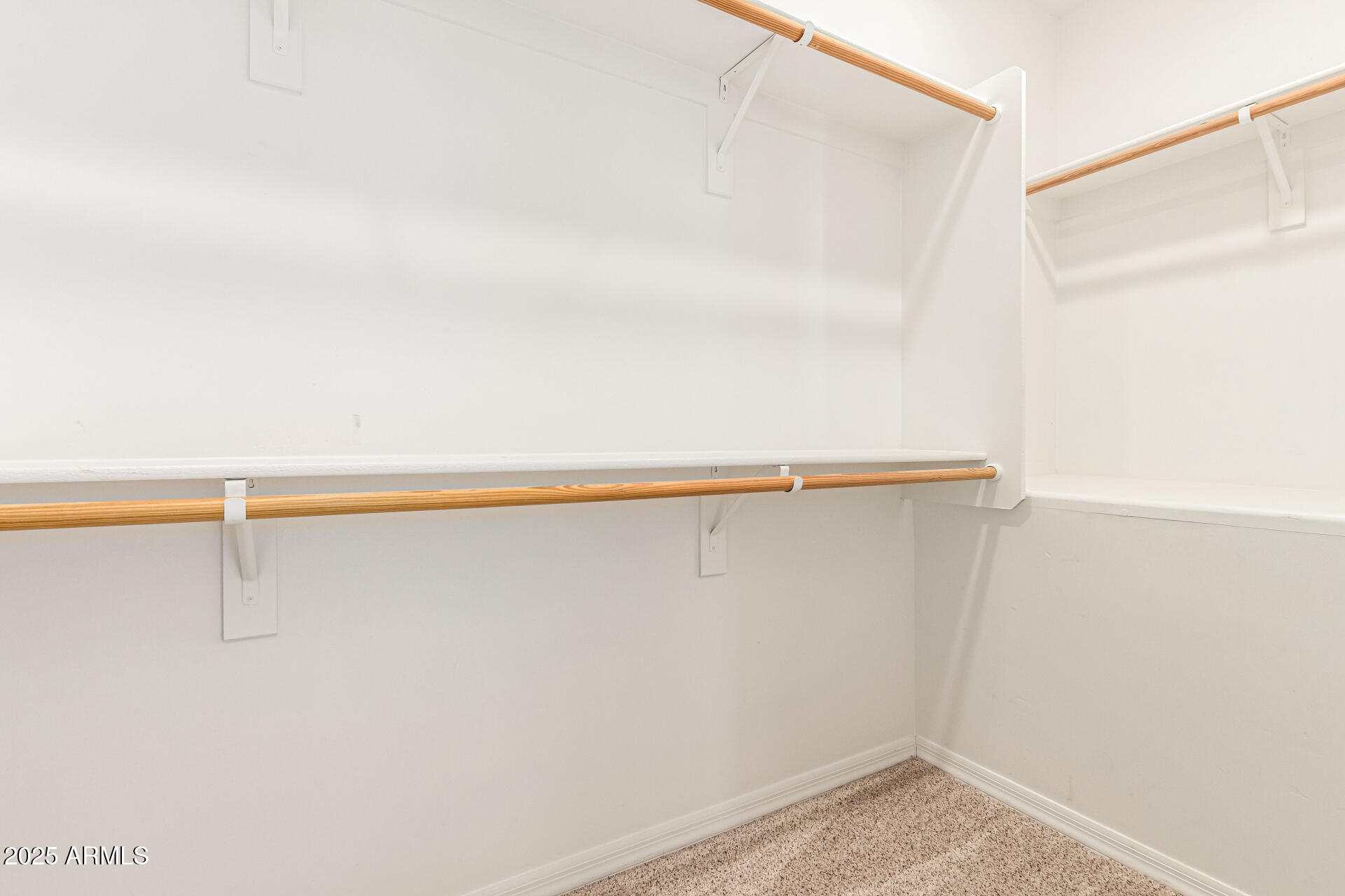 20660 North 40th Street, Unit 2120 Phoenix, AZ 85050 - Photo 18 of 39 a view of a room with racks on the wall