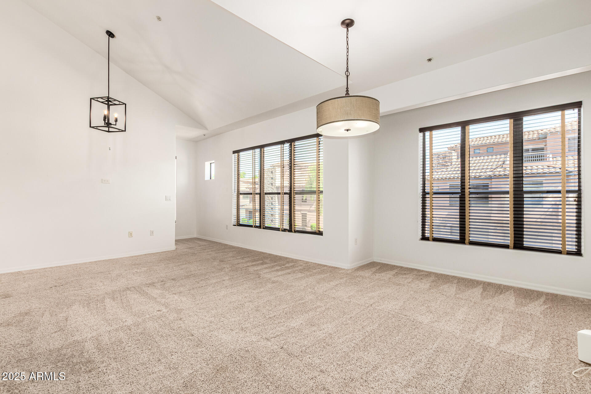 20660 North 40th Street, Unit 2120 Phoenix, AZ 85050 - Photo 2 of 39 a view of an empty room with a window