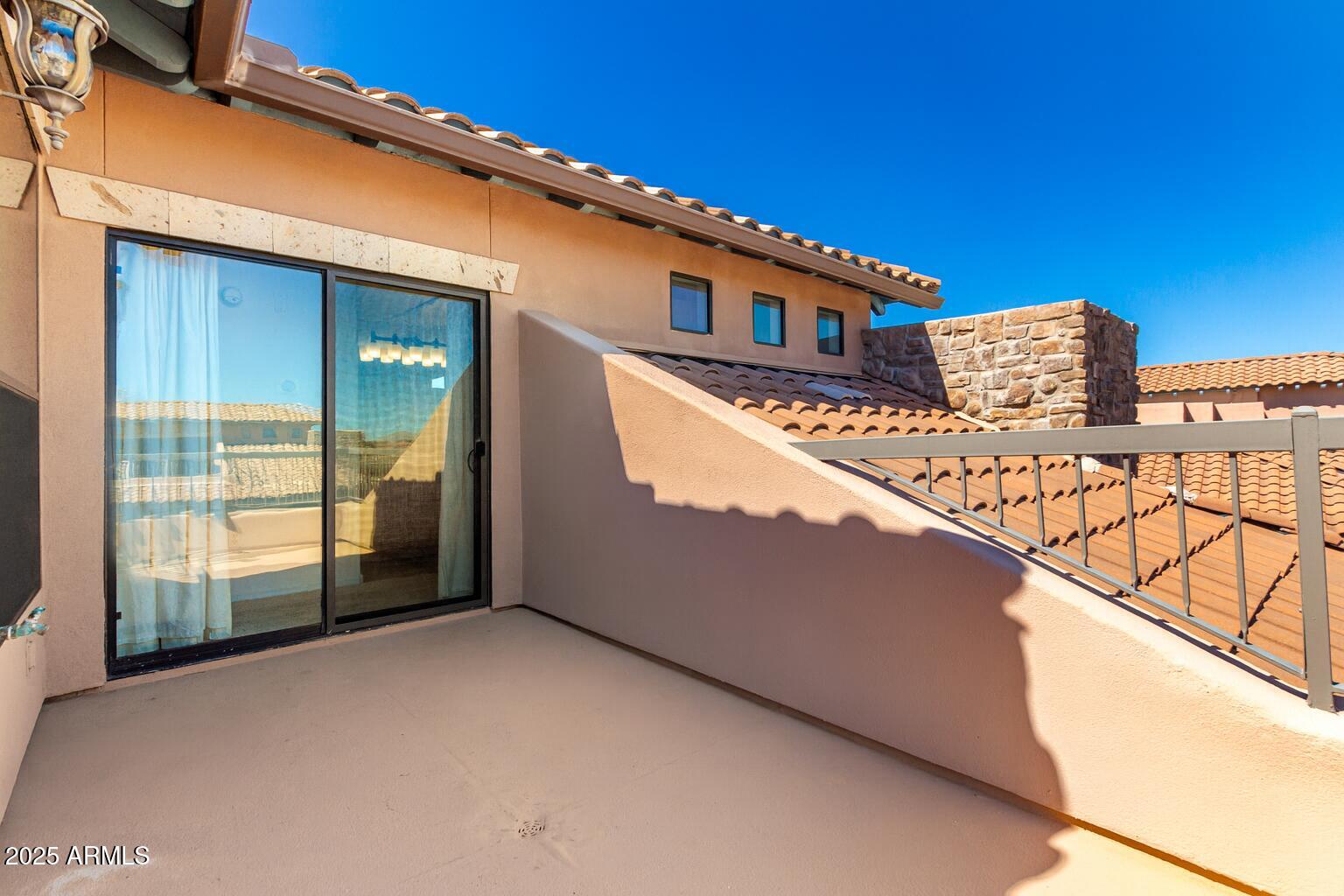 20660 North 40th Street, Unit 2120 Phoenix, AZ 85050 - Photo 25 of 39 a view of a balcony with an outdoor space