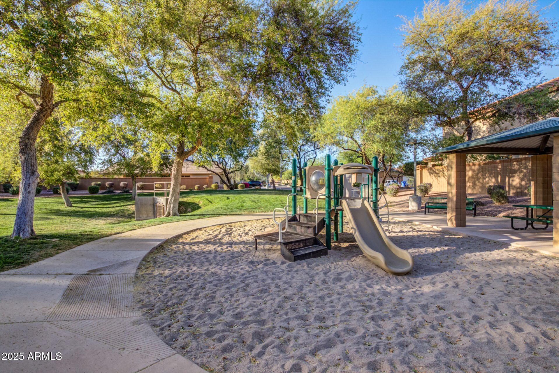 20660 North 40th Street, Unit 2120 Phoenix, AZ 85050 - Photo 27 of 39 a view of a park with swings and slides