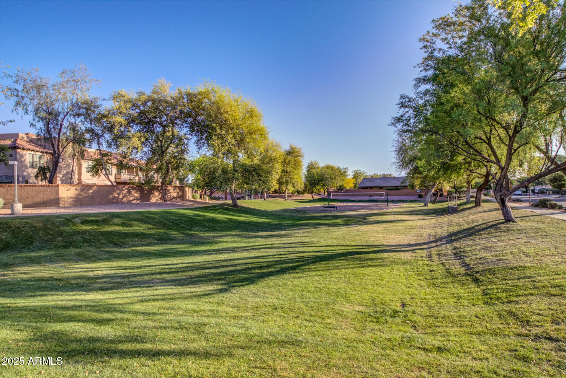 20660 North 40th Street, Unit 2120 Phoenix, AZ 85050 - Photo 30 of 39 a view of a swimming pool with a yard